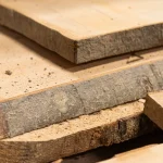 Thickness of extra grade 52 mm beech unedged board close-up