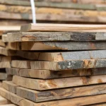 Stack of 52 mm unedged beech boards for furniture making in a warehouse