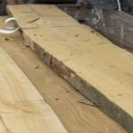 Texture and natural live edge of 52 mm Grade 1 beech unedged board