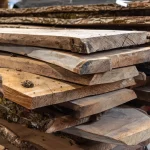 52 mm thickness of European walnut unedged boards stacked in a warehouse