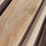 Close-up view showing texture and light brown color of beech edged timber, 52 mm.