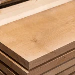 Top view of a premium extra grade edged cherry board showing beautiful natural grain and warm wood tone.