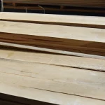 Extra grade 52 mm edged oak boards stacked in a warehouse
