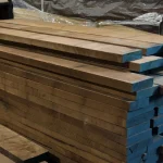 Thickness of premium grade American walnut edged boards, 54 mm, in a stack