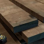 Edged American walnut lumber, 52 mm, stacked in stock at the warehouse