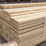 Stacked edged hornbeam boards of various thicknesses (up to 52 mm) in a warehouse.