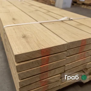 Grade 1 edged hornbeam boards, 52 mm, stacked in a warehouse for furniture and flooring.