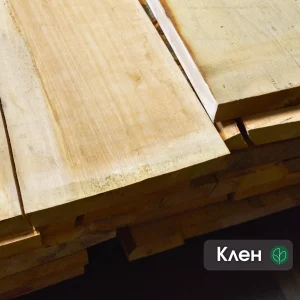 Stacked edged maple boards of the first grade with a clean light texture.