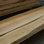 Top view of premium edged maple boards highlighting the uniform wood grain.