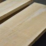 Two wide edged maple boards side-by-side highlighting the fine natural grain.