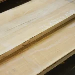 Close-up of the clean edge and face of an extra grade maple board.