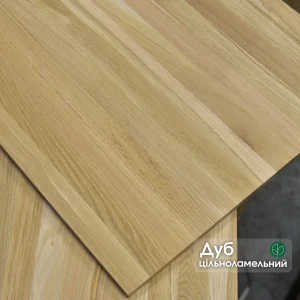 Solid-lamella oak furniture panel with a Ukrainian text label indicating the wood species.