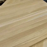 Angled view of the oak panel surface highlighting the beautiful natural pattern of wood fibers.