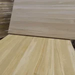 Two oak furniture panels arranged at an angle to display the natural wood pattern.