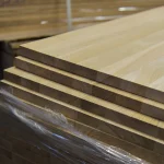 Side angle of stacked oak panels showing precise geometry and 20mm thickness.