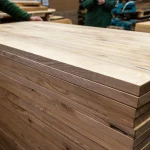 Side view of stacked 40mm ash furniture panels showing clean edges and solid construction.