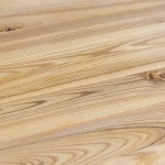 Detailed close-up of the rich natural grain pattern of rustic ash wood.