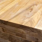 Close-up of the seamless glue joints and end grain of a 40mm solid ash panel.