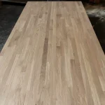 Longitudinal view along the surface of the 18mm finger-jointed oak board.