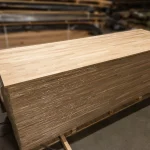 A stack of 20 mm oak furniture panels on a pallet in a warehouse.
