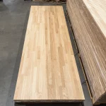 Long view of a single 3-meter finger-jointed oak panel lying flat.