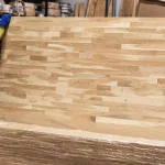 Full view of the wood pattern on a packaged finger-jointed oak board.