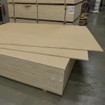 Large stack of HDF-faced blockboards measuring 2800x2070 mm in a storage facility.