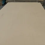 Smooth and even surface of the HDF-faced blockboard sheet.