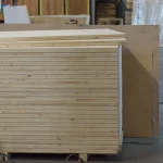 Large pallet stack of HDF-faced blockboards ready for shipment from the factory.