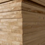 Close-up of blockboard edges showing the inner softwood core strips and Ceiba veneer layers.