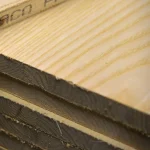 Close-up of the 14mm blockboard edge showing the solid wood core and ash veneer layer.