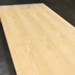 Full sheet of 14mm white ash veneered blockboard showcasing its elegant surface pattern.