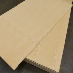 Full view of two white ash veneered blockboard panels arranged to show the grain variation.