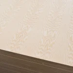 Detailed texture of the natural white ash veneer on a 19mm blockboard.