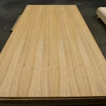 Full view of a 2500x1250 mm oak veneered blockboard panel showing grain pattern.