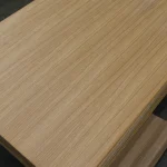 Angled close-up of the smooth, high-quality oak veneered surface.