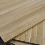 Close-up of the corner joint and beautiful wood grain of oak furniture panels.