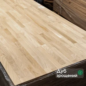 Surface of a finger-jointed oak board with a label reading 'Finger-jointed oak'.