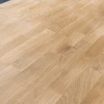 Close-up texture of the first-grade finger-jointed oak furniture panel.