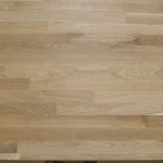 Natural wood texture and pattern of a finger-jointed oak edge-glued panel.