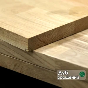 Finger-jointed oak furniture panel with a descriptive label showing the wood type.