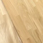 Smooth sanded surface texture of a finger-jointed oak edge-glued panel.