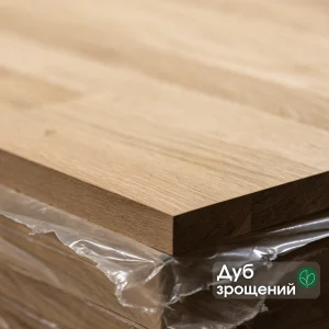 Stacked finger-jointed oak furniture panels with text overlay.