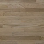 Top-down view of the smooth surface of a finger-jointed oak edge-glued panel.
