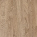 Surface texture of a finger-jointed oak panel showing wood grain and joint patterns.