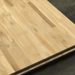 Perspective view of the jointed oak furniture board with natural color variations.