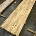 Full-length view of the 3-meter long finger-jointed oak furniture panel.