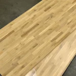 Two stacked finger-jointed oak panels showing their textured wooden surfaces.