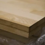 Close-up of the oak board edge showing the 40mm thick sandwich construction.