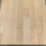 Top-down view showing the natural wood grain and finger-joint pattern of the alder panel.